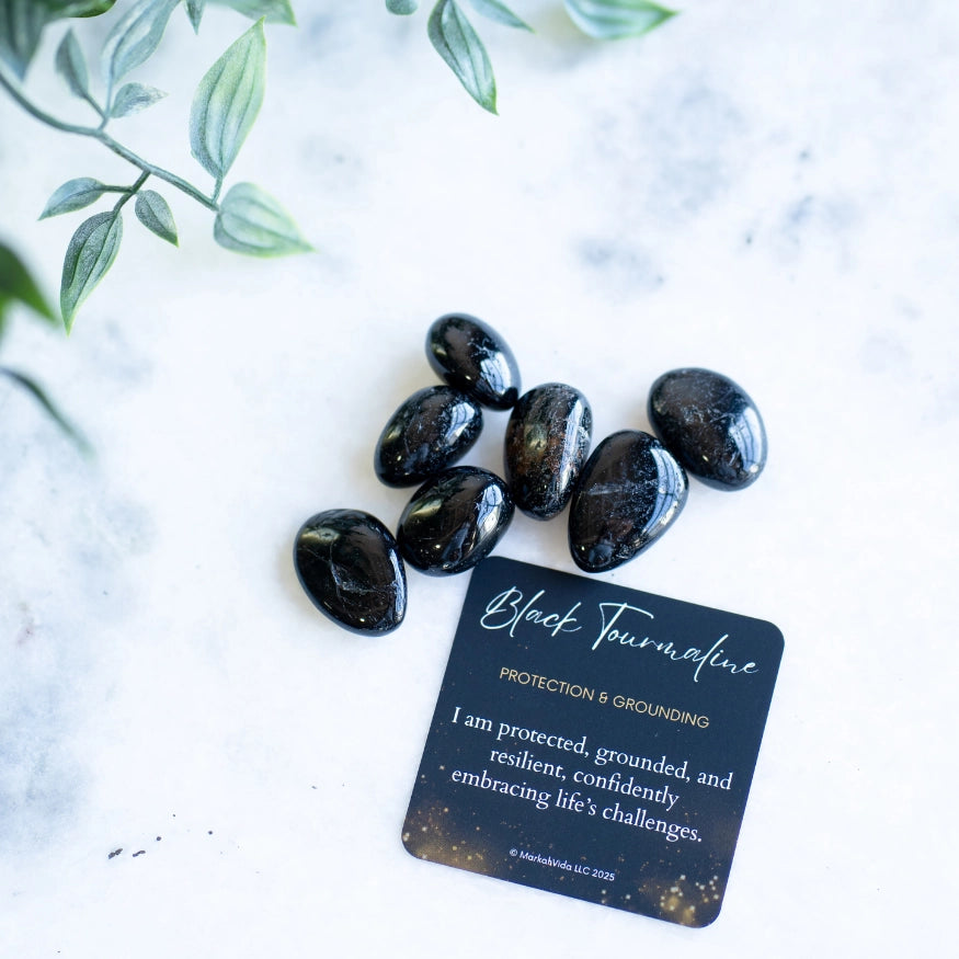 The Evoline Black Tourmaline Protection and Grounding Tumbled Stones and affirmation card.