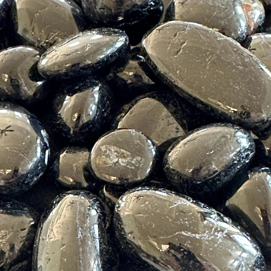 The Evoline Black Tourmaline Protection and Grounding Tumbled Stones.