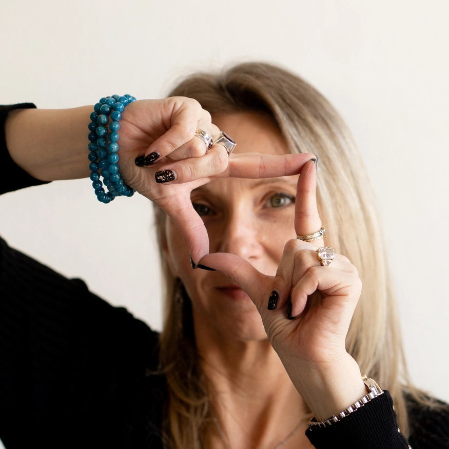 Rebekah wearing the Blue Apatite bracelets as a stack. The Evoline Blue Apatite Clarity and Inspired Action Bracelet, stacked bracelets, healing energy 