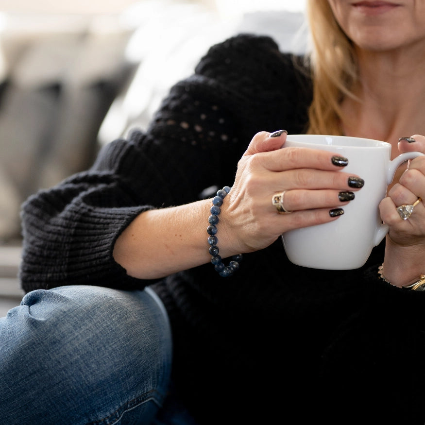 Rebekah wearing The Evoline Blue Kyanite energetic alignment and clear communication bracelet.