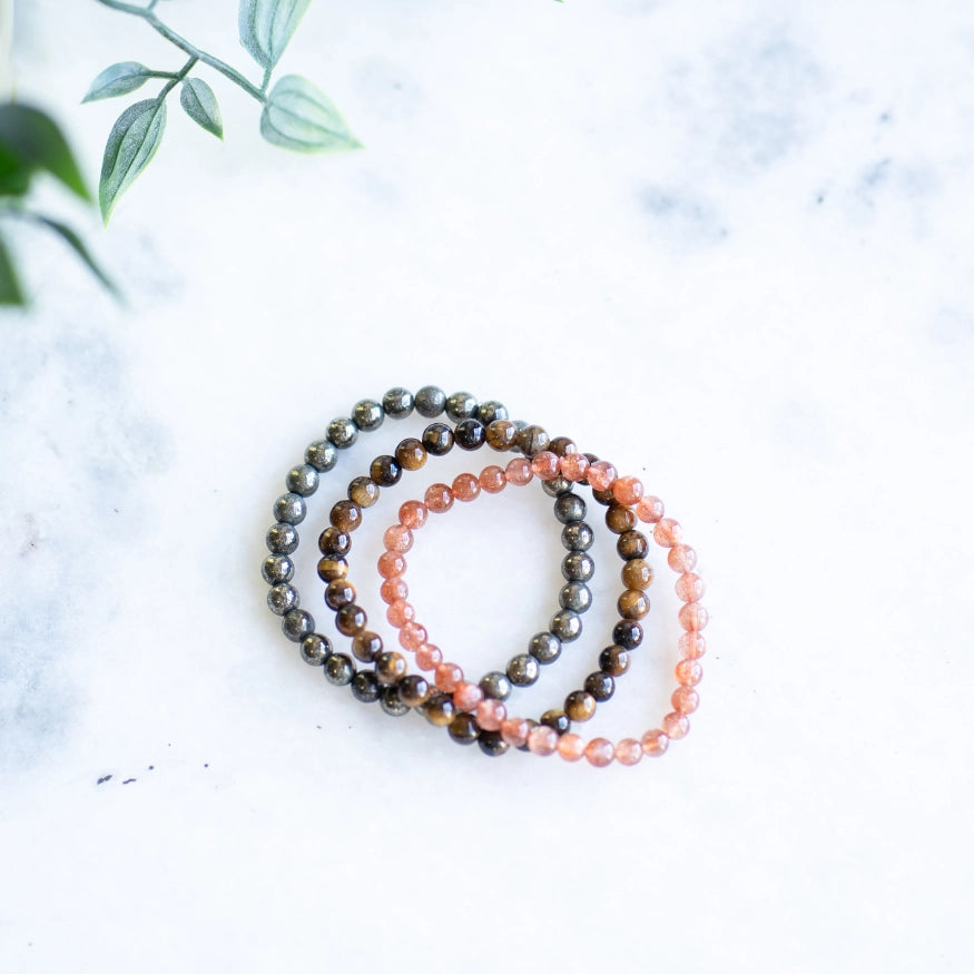 The Evoline Shine Your Light 3-Bracelet Stack: Sunstone, Tiger’s Eye & Pyrite (Success)