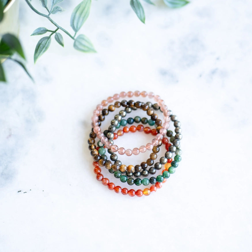 The Evoline Action & Magnetism 5-Bracelet Stack: Carnelian, Green Aventurine, Tiger’s Eye, Sunstone & Pyrite