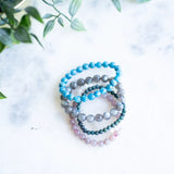 The Evoline Vision & Alignment 5-Bracelet Stack: Labradorite, Rose Quartz, Moonstone, Blue Apatite & Ruby in Kyanite