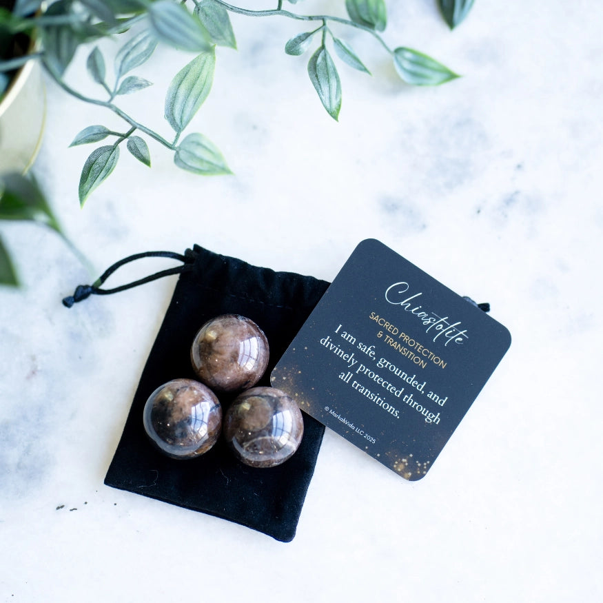 The Evoline Chiastolite Sacred Protection & Transition Polished Sphere with affirmation card