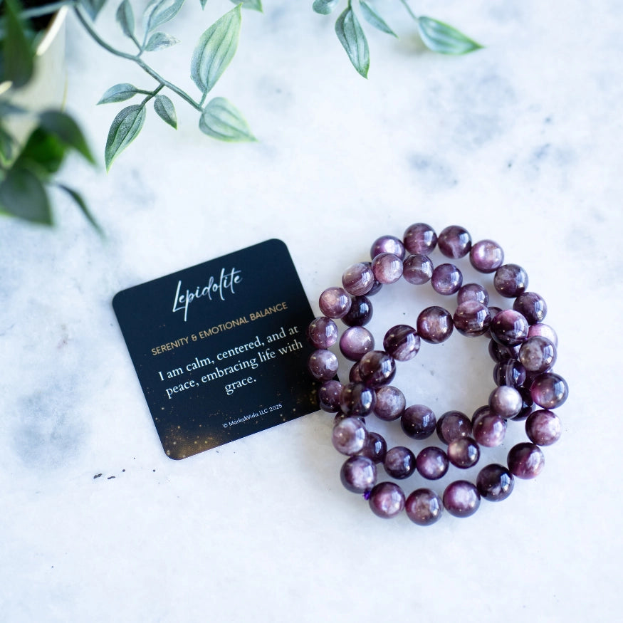 The Evoline Lepidolite Serenity & Emotional Balance Bracelet with Affirmation card.