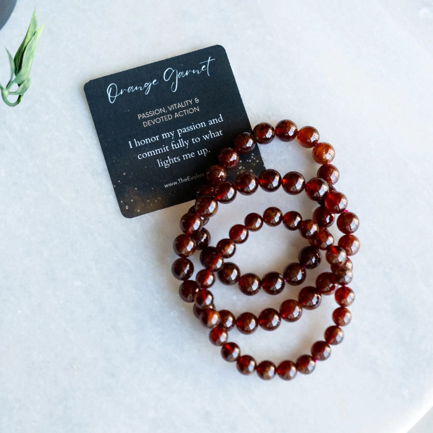 Orange Garnet bracelets with affirmation card from The Evoline