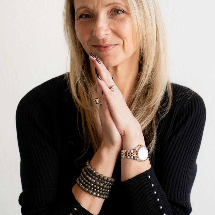 Rebekah wearing The Evoline Pyrite Abundance & Security Bracelet.