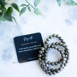 The Evoline Pyrite Abundance & Security Bracelet with affirmation card.
