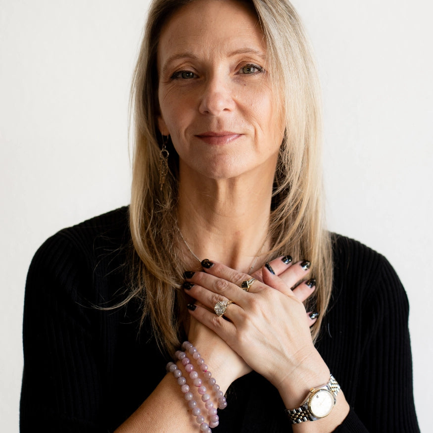 Rebekah wearing The Evoline Rose Quartz Unconditional Love Bracelets