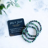 The Evoline Ruby & Zoisite Aligned growth and soul healing Bracelet with affirmation card.