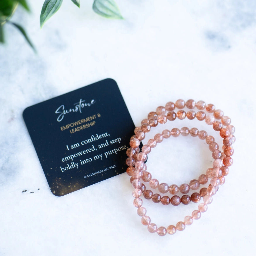 The Evoline Sunstone Empowerment & Leadership Bracelet shown with affirmation card.