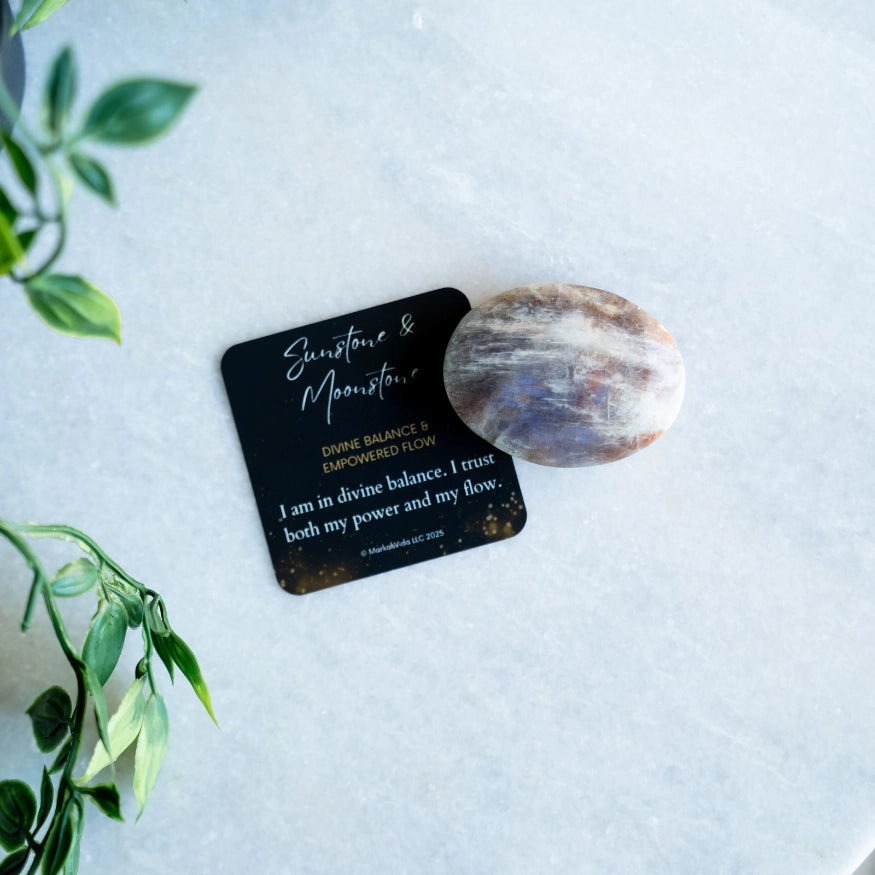 Sunstone & moonstone palm stone from the evoline with an affrimation card